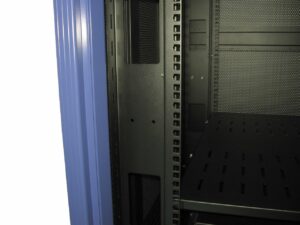 Close up of Cable Management (Located at Rear) are located vertically on the front and back of the cabinet used to maintaint neat and tidy arrangement of cable routing within the cabinet. 