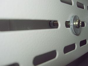 Internal secured side panel Locked in postion by Screw and nut (Internal View)